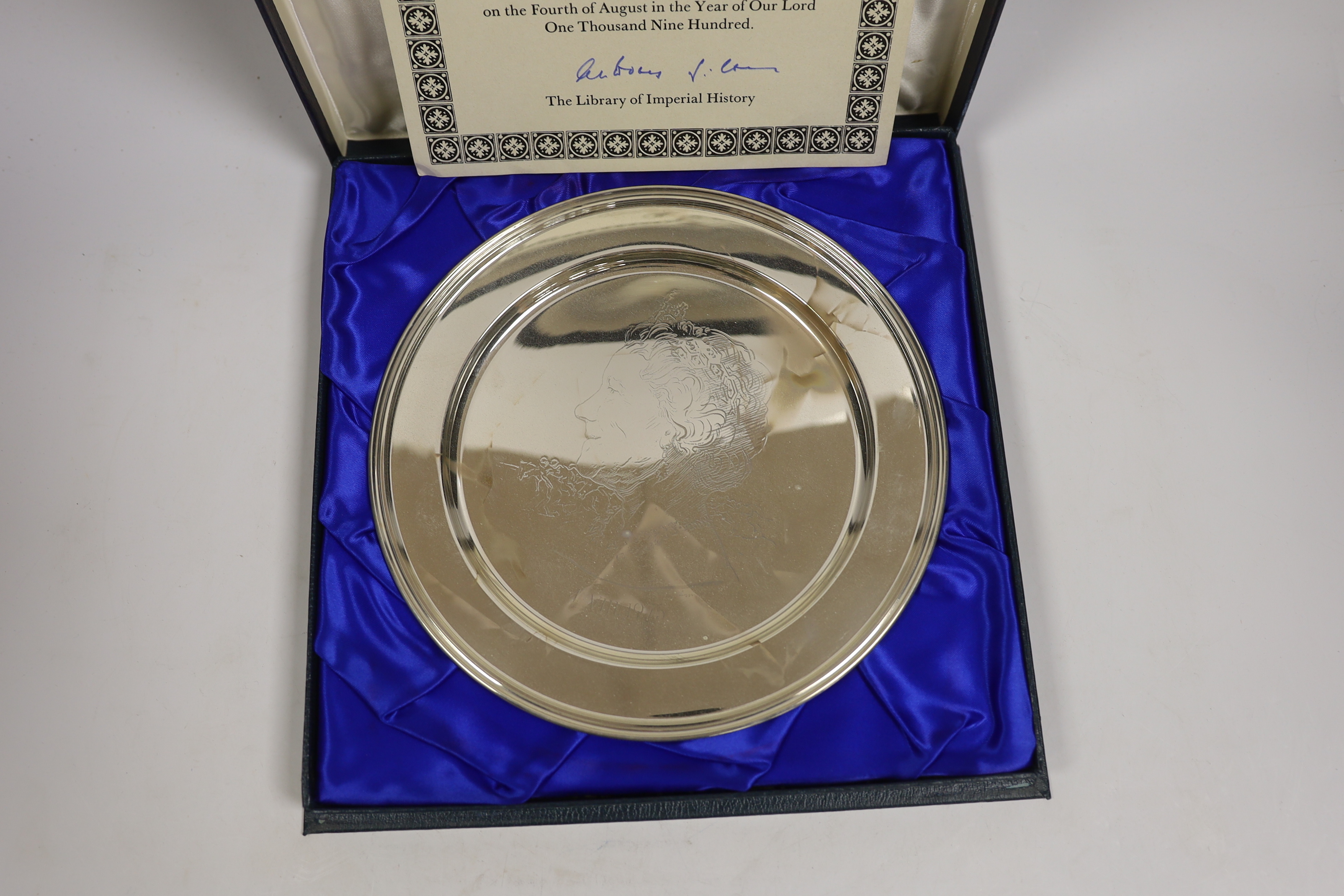 A cased limited edition silver plate commemorating the Jubilee Birth of The Queen Mother, designed by Annigoni, Library of Imperial History, London, 1975, 22.8cm, 12.5oz.